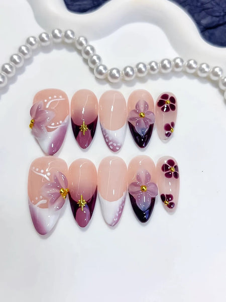 Plum Moonlight Press-On Nägel Mandelform mittellang, Lila mit goldenen Akzenten