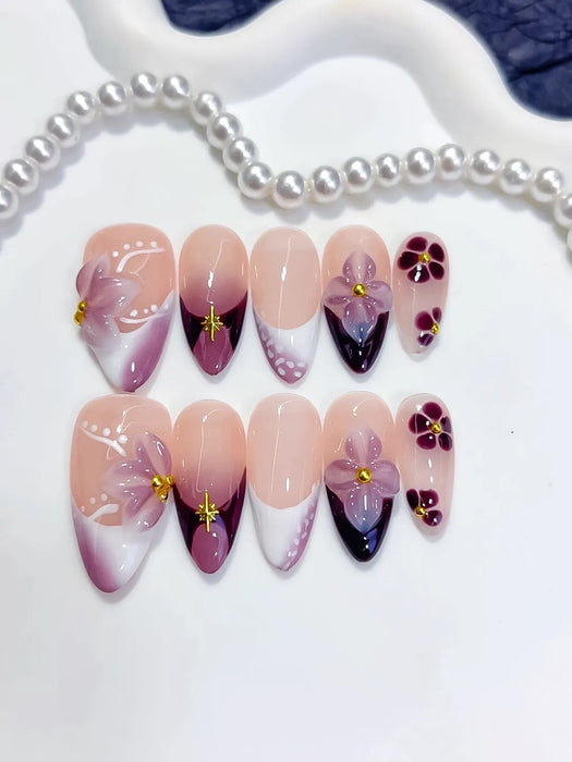 Plum Moonlight Press-On Nägel Mandelform mittellang, Lila mit goldenen Akzenten